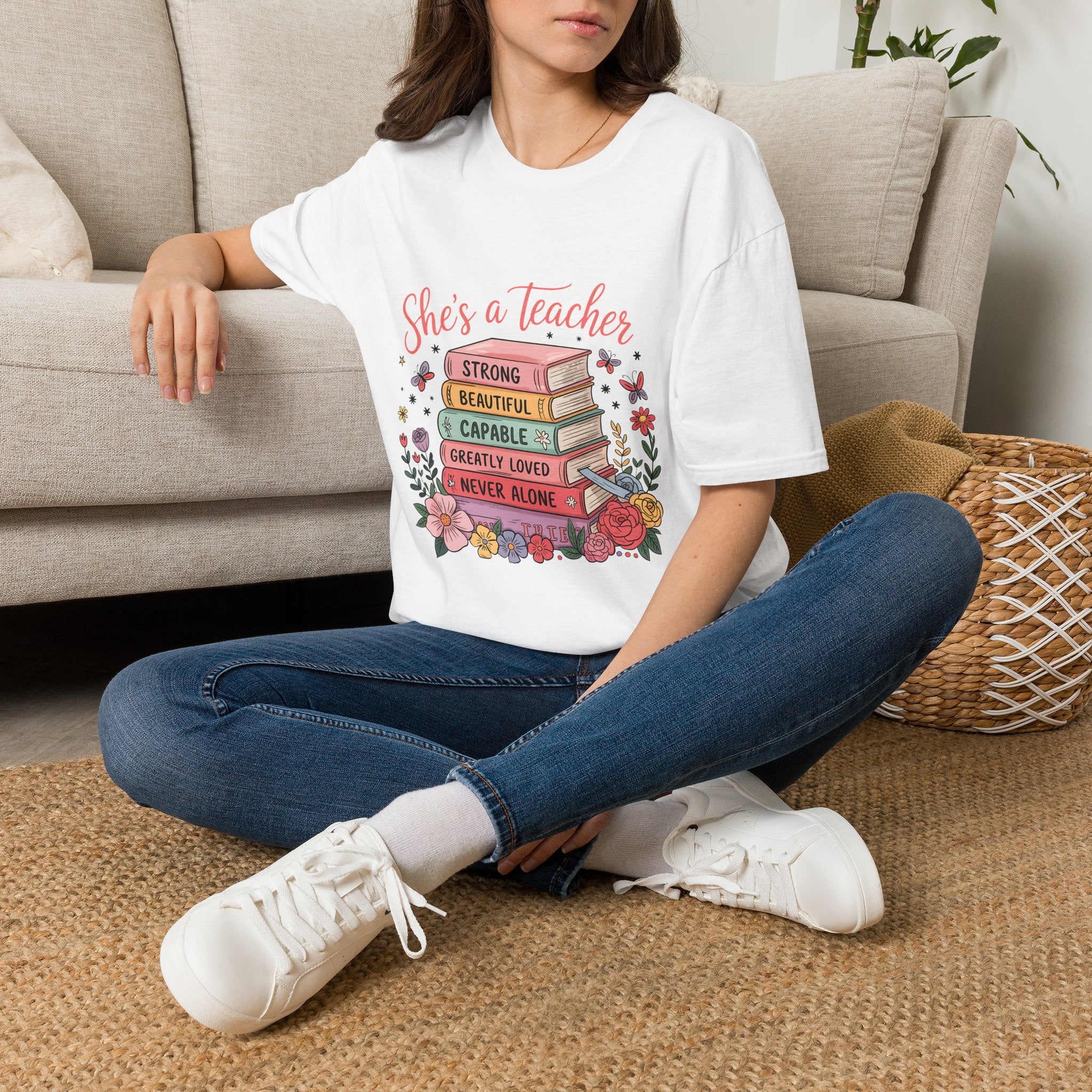 She's a Teacher stack of books floral design T-Shirt | teacher appreciation, inspirational quote