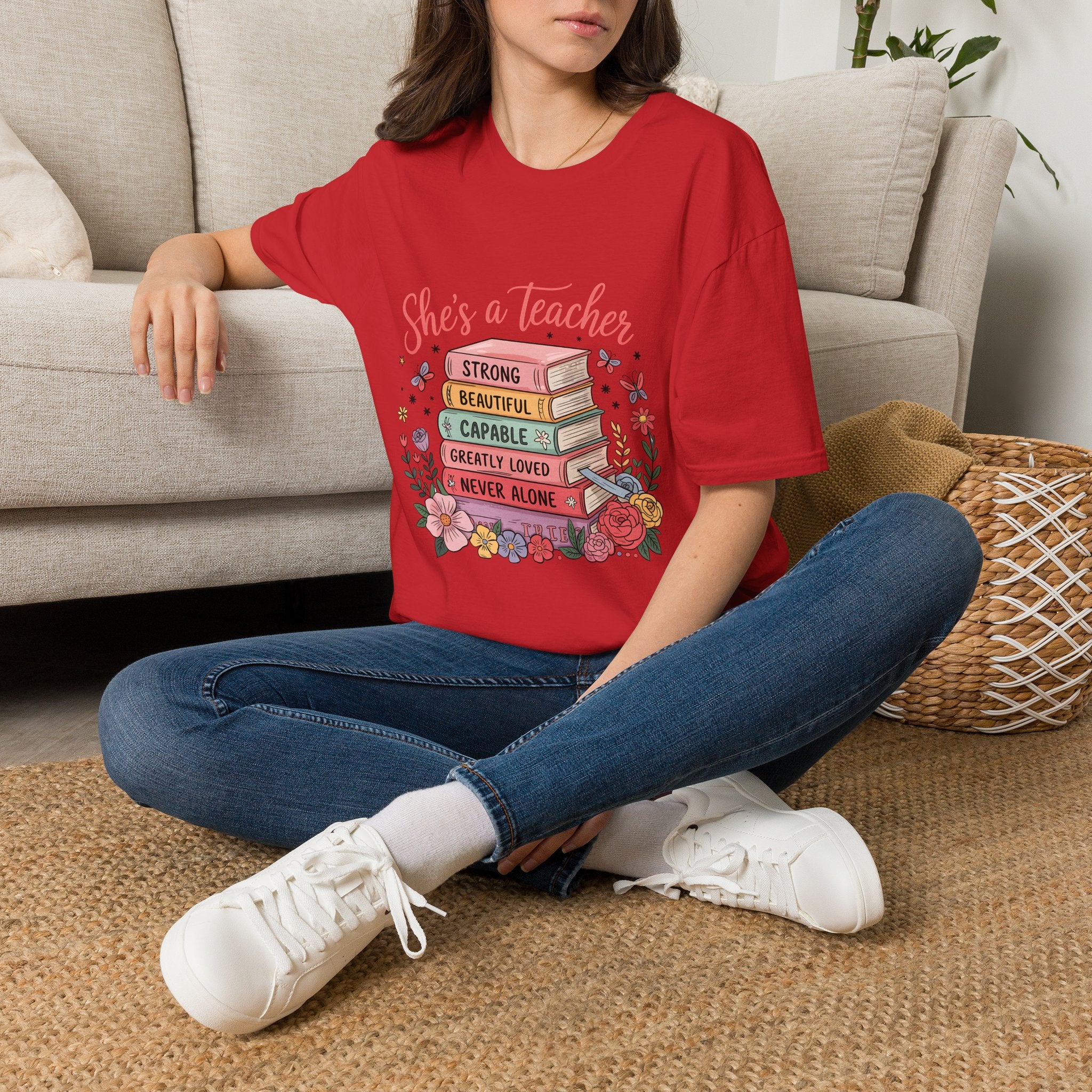 She's a Teacher stack of books floral design T-Shirt | teacher appreciation, inspirational quote