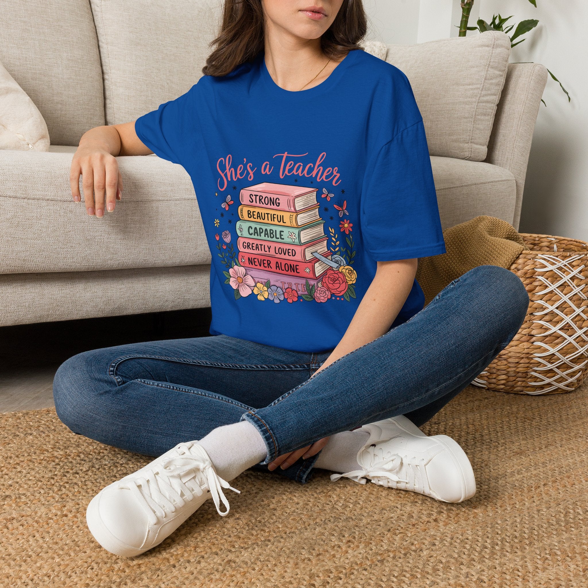 She's a Teacher stack of books floral design T-Shirt | teacher appreciation, inspirational quote