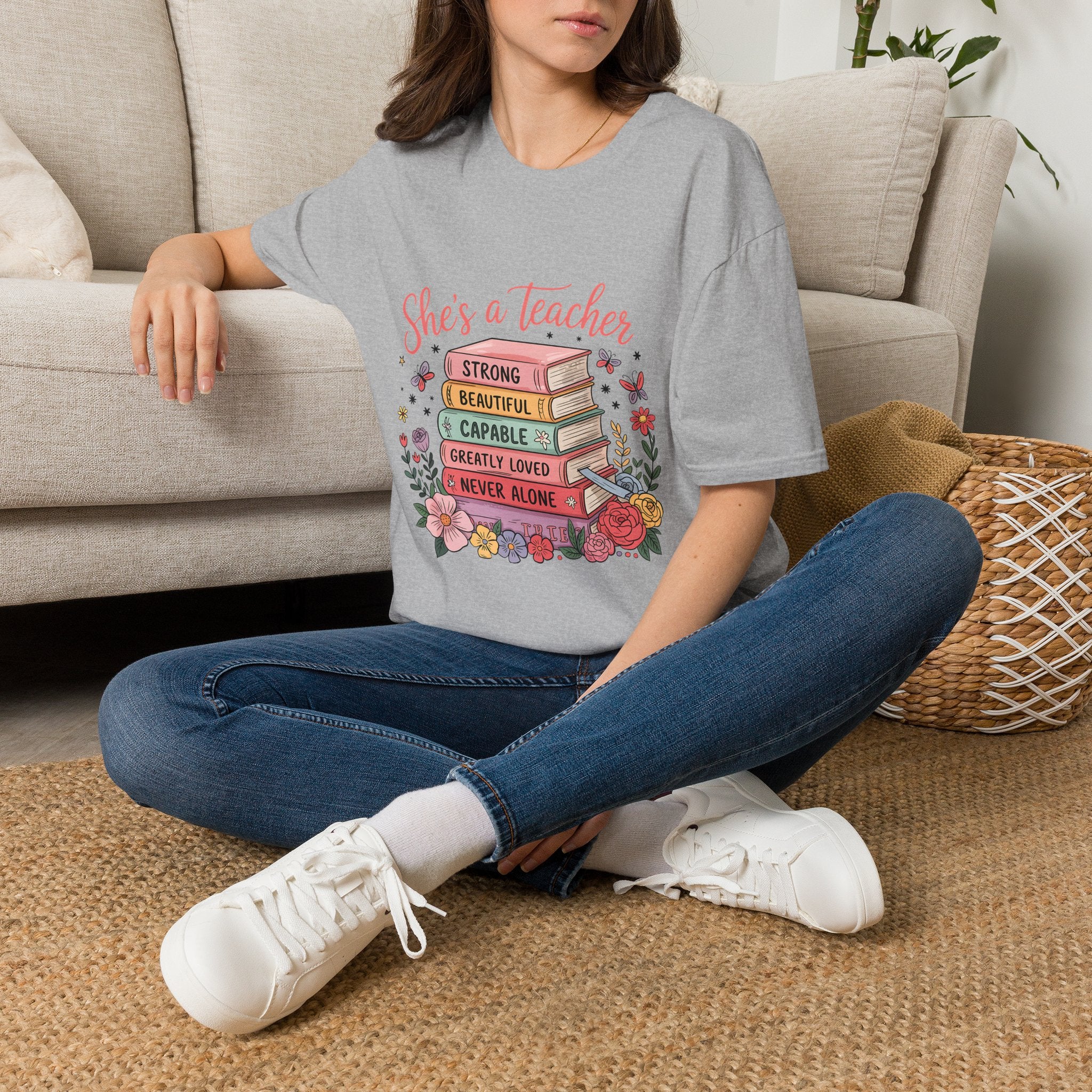 She's a Teacher stack of books floral design T-Shirt | teacher appreciation, inspirational quote